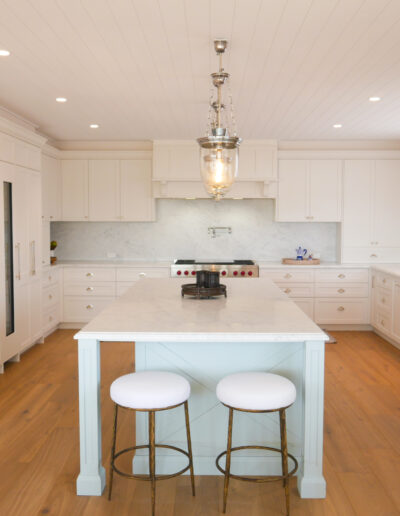 Hamptons-style kitchen two-toned with custom island