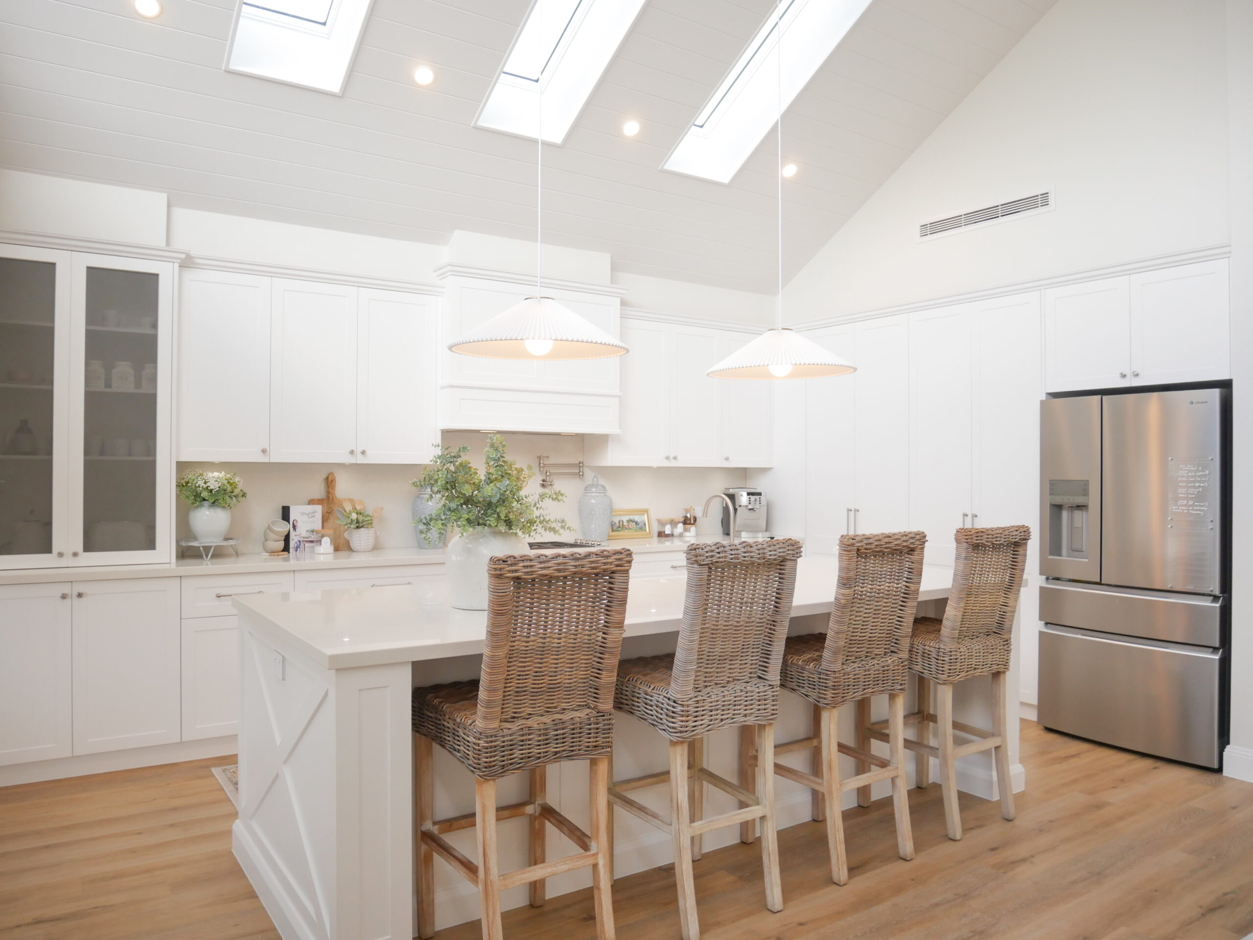 Modern kitchen featuring custom 2Pac polyurethane painted cabinets with a smooth seamless finish in Sydney home